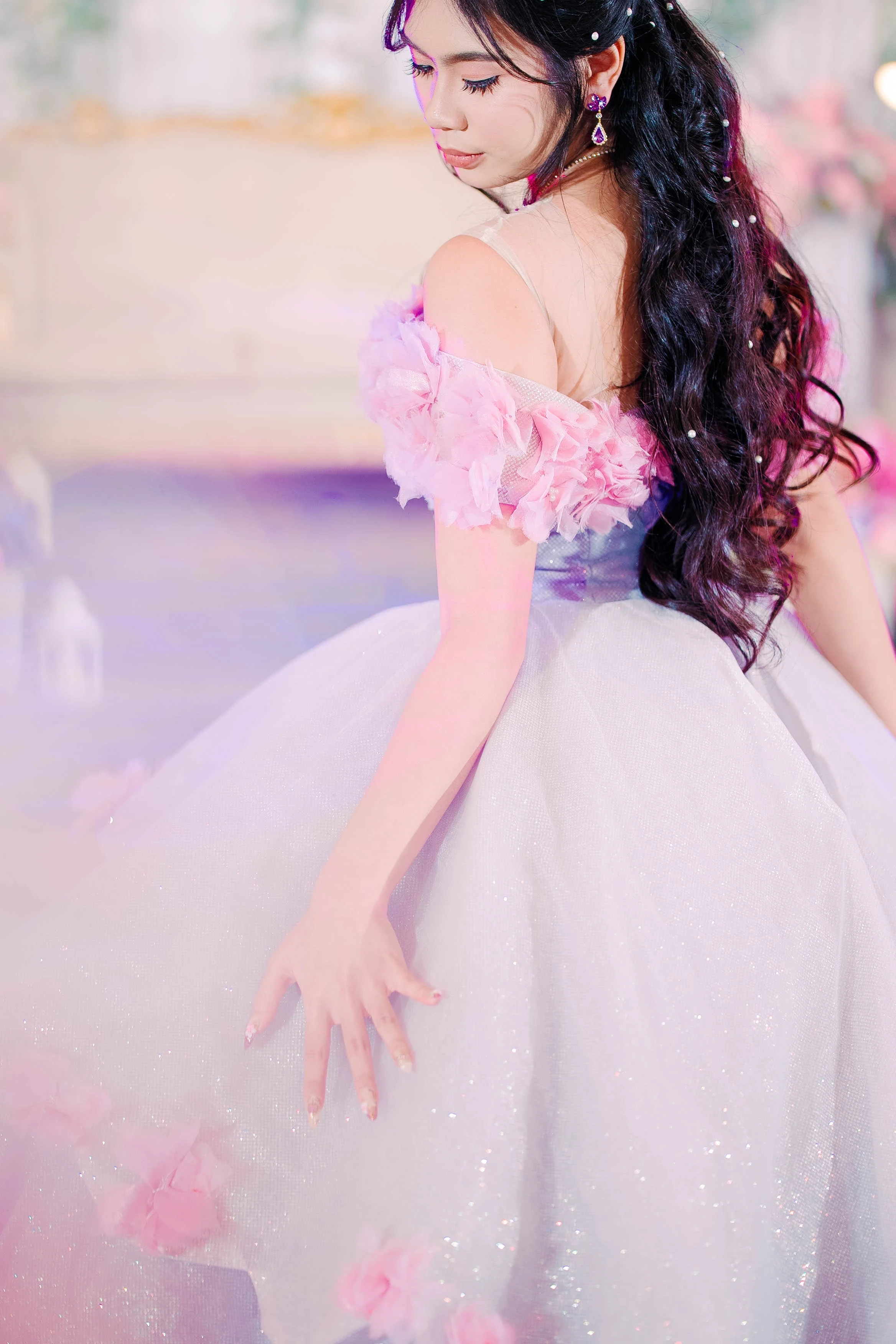 A quiet close-up in a pink gown
